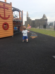 Toddling around Aberystwyth castle in his first shoes!